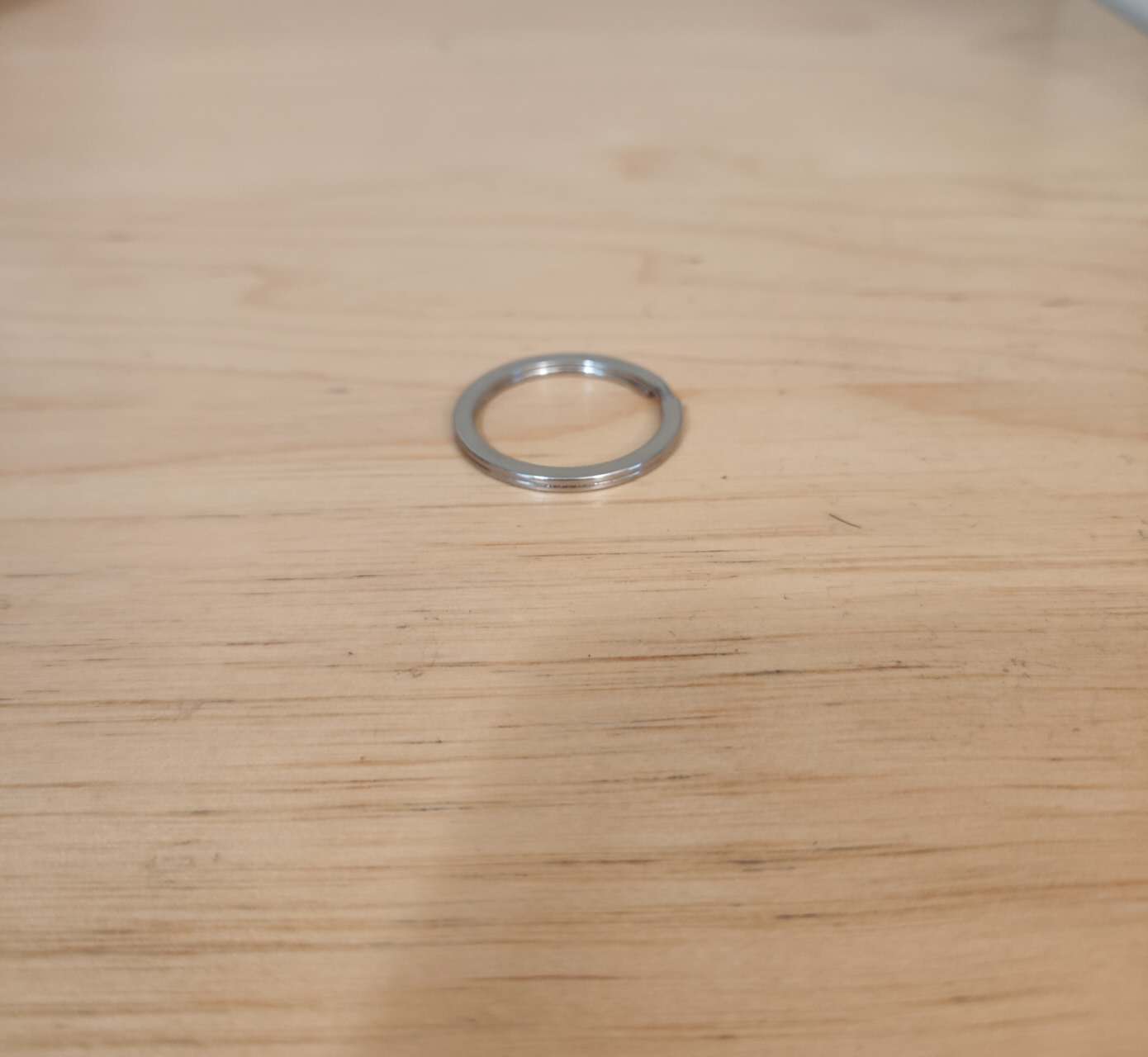This is the ring of my keychain from another angle, with the keys removed. It can be easily recognized as a torus and is very easy to carry.