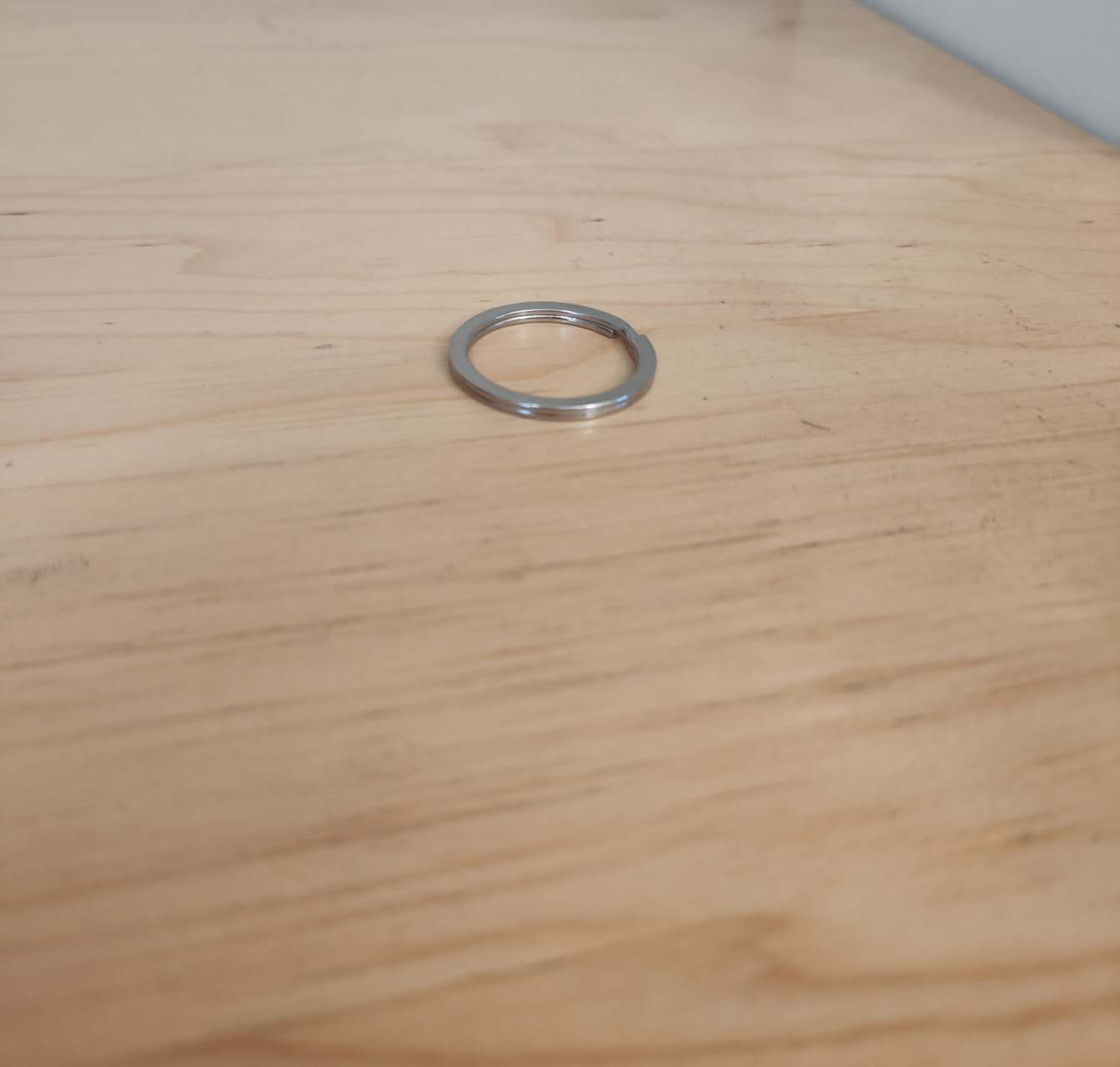 This is the ring of my keychain from another angle, with the keys removed. It can be easily recognized as a torus and is very easy to carry.