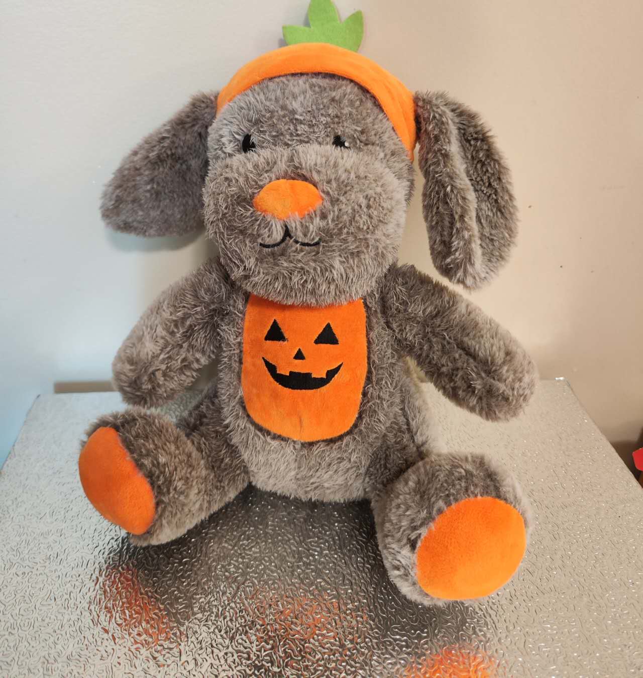 This is a dog toy doll. It has various parts and is a complex geometry.