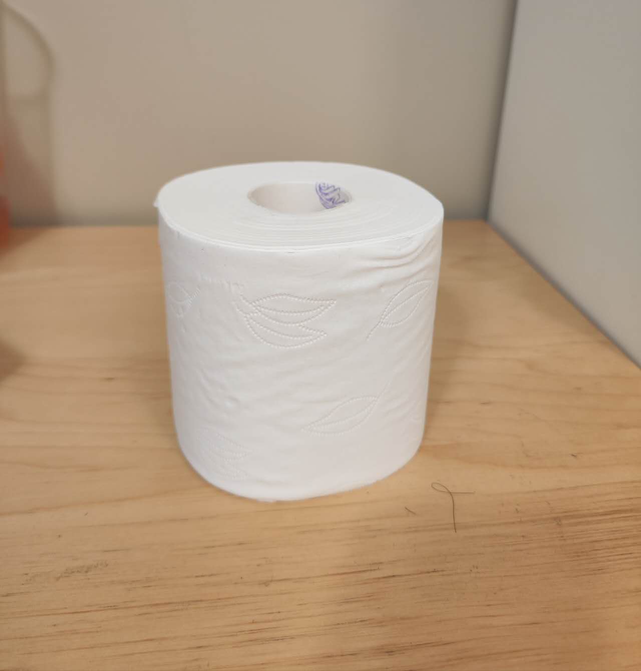 This is a tissue roll, a cylinder. It is very easy to carry.